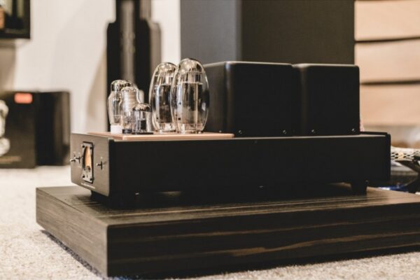 Chameleon Audio Shelves Stands with a Preamplifier on Top